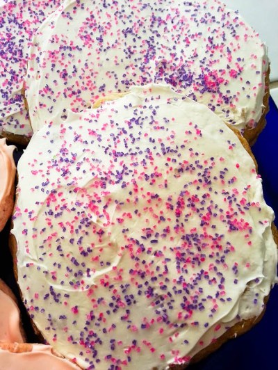 This is a cotton candy cookie with a whipped cream cheese frosting and pink and purple sprinkles.  Yum. Cookie By: Elizabeth Preston Photo By: Elizabeth Preston 